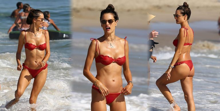Alessandra Ambrosio looks fabulous in a red bikini as she is seen cooling off at the beach